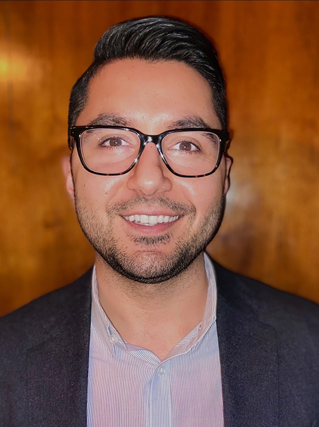 smiling man wearing glasses