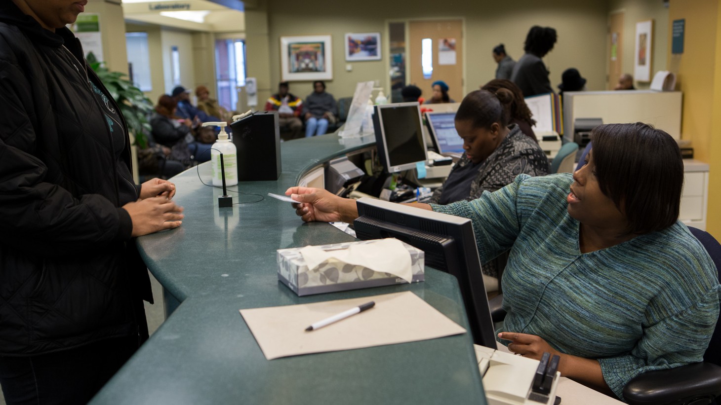 Receptionists at work.