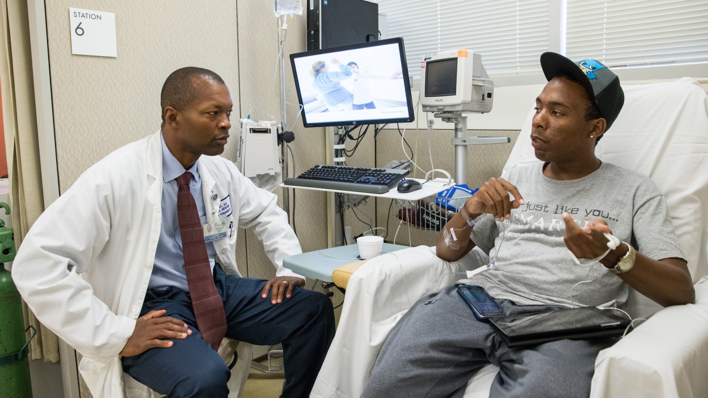 Doctor and patient talking together 